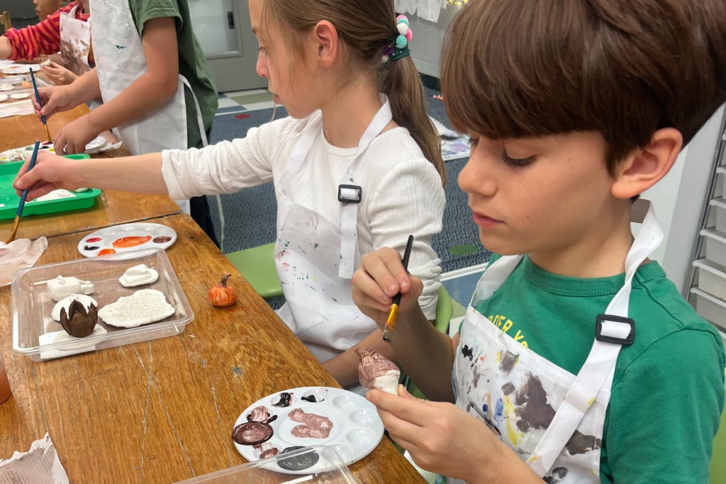 Kids painting in class